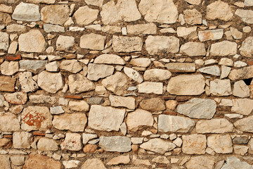 Pattern of old stone wall, surfaced