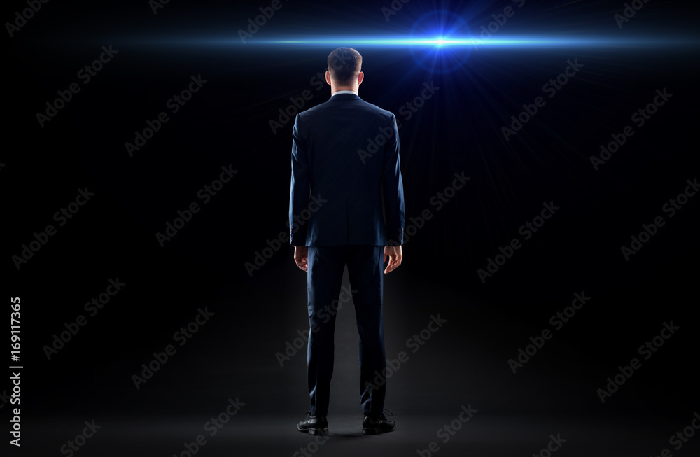 Sticker businessman in suit from back with laser light