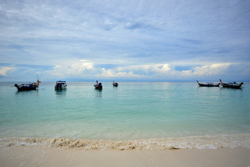 Fototapeta na wymiar Crystal clear water at Andaman Sea. Lipe Island, Satun, Thailand.
