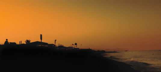 Fototapeta premium Vacation holiday background: Sunset Scene at Tropical Beach Resort. Turkey