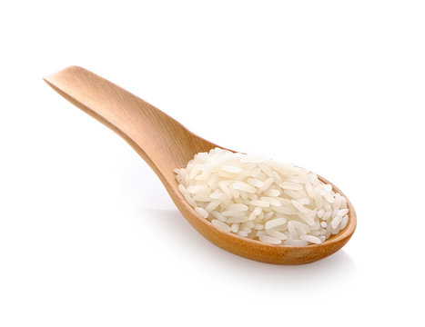 rice in wood spoon on white background