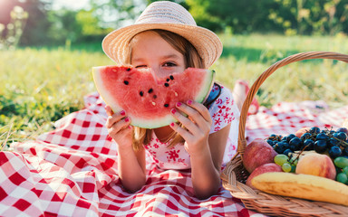 Picnic time. Little girl enjoying in picnic. Nature, lifestyle