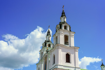 Fototapeta na wymiar Church in the capital of Belarus in the city of Minsk against the background of the sky and clouds.