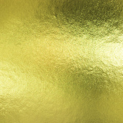 Gold foil leaf metallic wrapping paper shiny texture background for wall paper decoration element