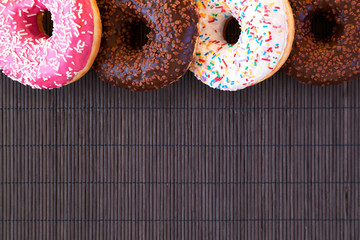 Colorful donuts on table