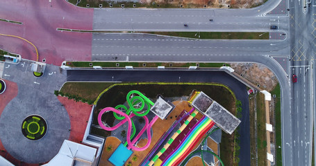 An aerial view of theme park and road.