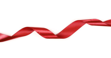 Red ribbon isolated on white background, top view