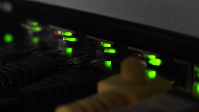 Network switch with blinking LEDs (4K footage)