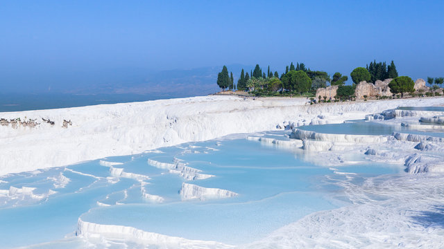 Terraces of travertines filled with water in Pamukkale, Turkey