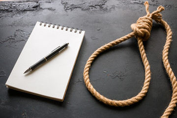 Concept of suicide - note and rope loop