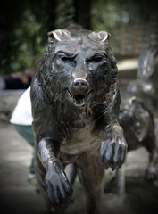 Fototapeta na wymiar Bronze statue of a wolf head