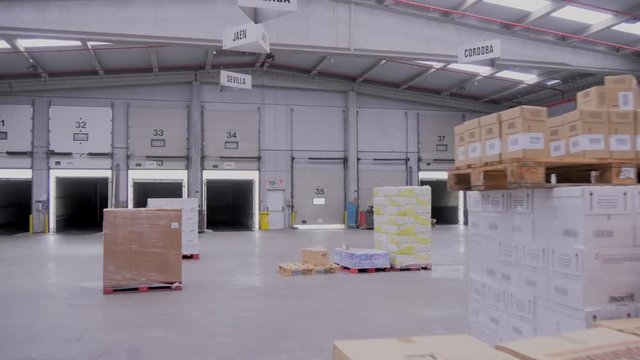 Loading docks for trucks in logistics warehouse