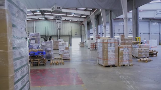 Pallet truck working in warehouse