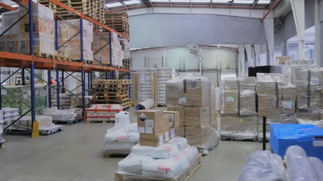 Loading docks for trucks in logistics warehouse