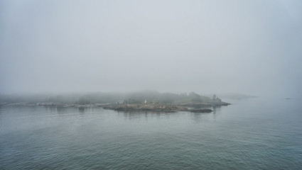 Small islands near Helsinki in the fog