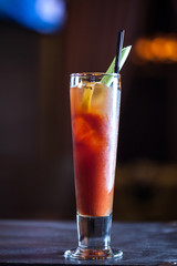 closeup of bloody mary cocktail on a dark background at the bar