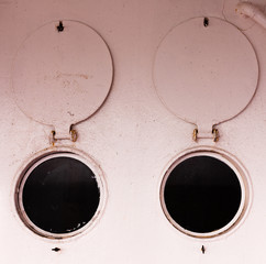 Bulleye portholes open round shutters abstract