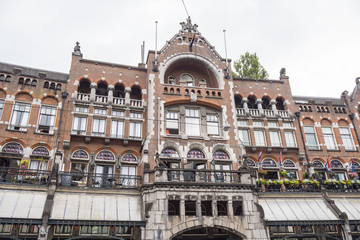 Fototapeta na wymiar Wonderful buildings in Amsterdam - AMSTERDAM - THE NETHERLANDS - JULY 20, 2017