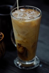 Ice coffee with milk for breakfast view