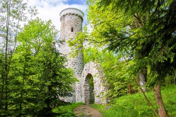 Fototapeta premium Hamelika lookout tower was built in the shape of a romantic ruin - Marianske Lazne (Marienbad) - great famous Bohemian spa town in the west part of the Czech Republic (region Karlovy Vary)