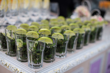 Rows of empty glasses prepared for reception