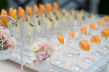 Rows of empty glasses prepared for reception
