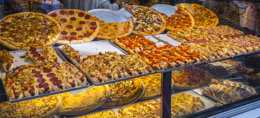Pizza and more fast food street sale in Amsterdam