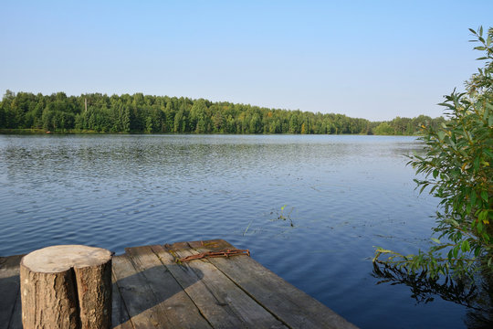 Morning at the boat pier on the river Suda