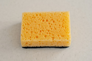 Yellow washcloth on the table