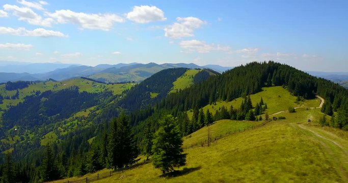 Aerial view of the Carpathian Mountains and a road on top, Ukraine. Drone flight