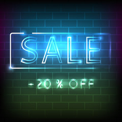 Sale neon sign on the brick wall