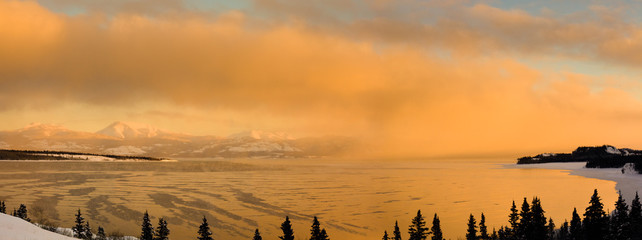 Sunset over steaming lake