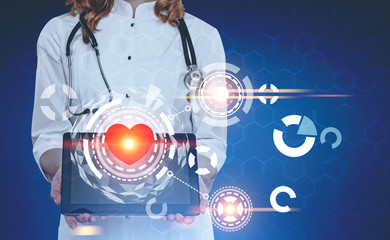 Woman doctor with a tablet and a heart HUD