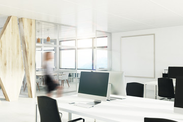 Open space office with a wooden wall, corner, girl