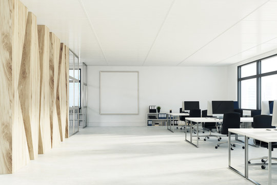 Open space office with a wooden wall, poster
