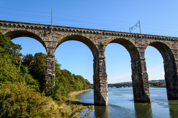 Fototapeta na wymiar Old stone railway viaduct