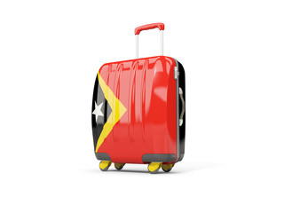 Luggage with flag of east timor. Suitcase isolated on white