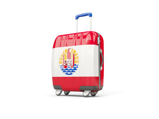 Luggage with flag of french polynesia. Suitcase isolated on white