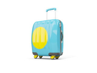 Luggage with flag of palau. Suitcase isolated on white