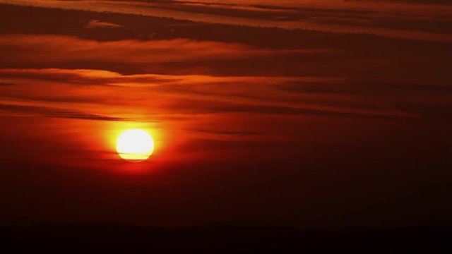 Sunrise with clouds global warming concept - time lapse
