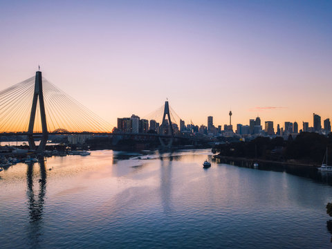 Sydney city and anzac bridge view at sunrise time.