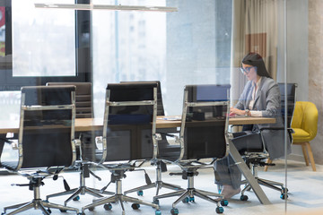 businesswoman using a laptop in startup office