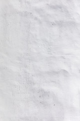 bumpy plaster wall texture painted white as background