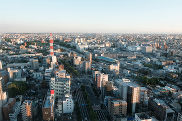 Fototapeta na wymiar ビルの屋上から見た都会の景色