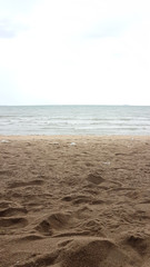 Sand beach with sand dune and sand slope with sea view