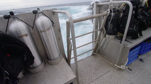 A medium shot of air gas tanks and scuba diver equipment