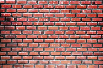 Empty brick red wall with flash lighting .Copy space for products display montage