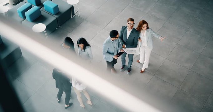 Group of business people collaborating and working on project