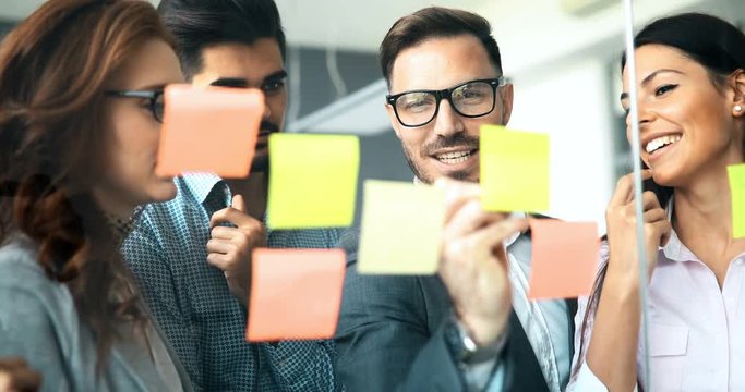 Creative business people working on business project in office