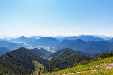 Fototapeta na wymiar Valley with City of Ruhpolding in the Alps, Bavaria, Germany, summer day, view from Mt. Hochfelln